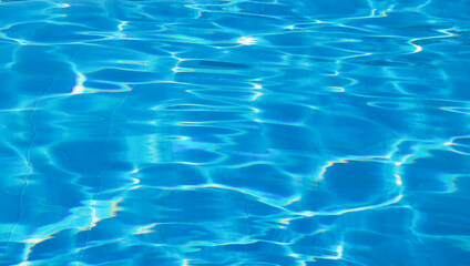 surface of blue swimming pool,background of water in swimming pool.