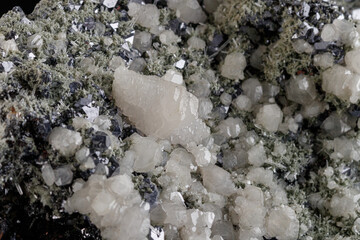 macro stone mineral Quartz Calcite Sphalerite Galena on a black background