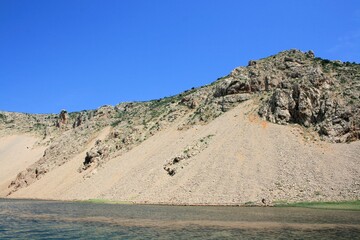 sand, rocks and the lovely Zrmanja river between Obrovac and the Novigrad sea, Croatia