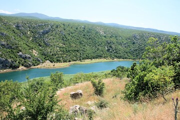 Fototapeta na wymiar lovely blue and green , the Zrmanja river, Croatia