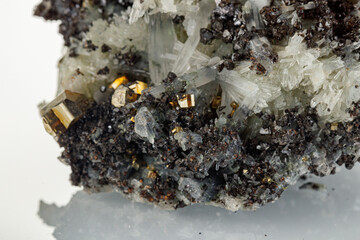 macro mineral stone Quartz Galena Pyrite on a white background