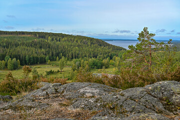 wiew overlooking fields forests and a lake