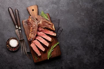 Tuinposter T-bone grilled beef steak © karandaev