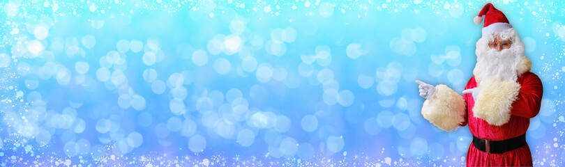 adult santa claus with white beard pointing to the side, concept of christmas, waiting for gifts, sales and discounts, festive mood