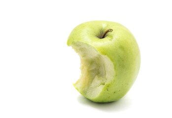 bitten green apple isolated on white background