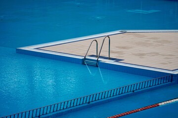 empty  competition pool,  blue water, summer season,