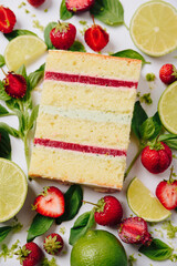 Slice of cake in the section on the background of fruit