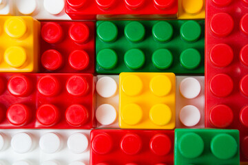 Background from colored cubes of details of the children's designer.