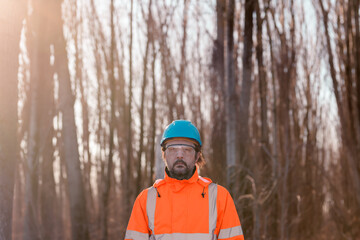 Forestry technician in forest, portrait of tree nursery professional