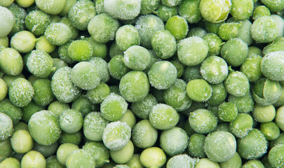 Closeup of a heap of frozen peas