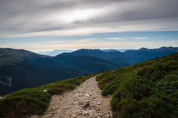 Trekking path in Guadarrama mountain range on a cloudy day, Peñalara, Madrid, Spain