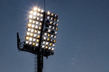 stadium lights reflector and dark blue sky