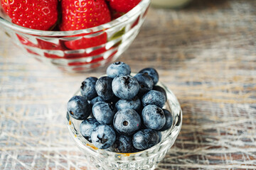 Strawberries and blueberries for dessert close up,top view