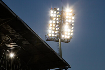 stadium lights reflector and dark blue sky