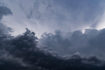 Naklejka na ściany i meble dark storm clouds with background,Dark clouds before a thunder-storm.