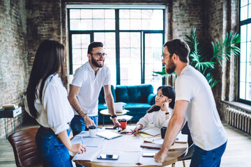 Male and female managers working together