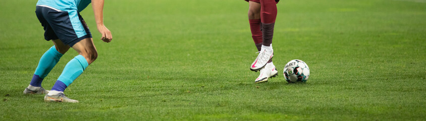 Fototapeta premium soccer game background player kicking football