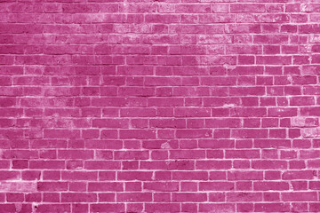 Naklejka na ściany i meble Pink brick wall. Interior of a modern loft. Background for photo and video filming. The facade of a brick building.