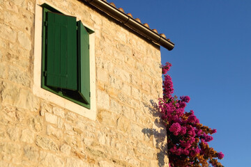 Fototapeta na wymiar Traditional stone house and wooden window in Split, Croatia.