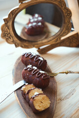Traditional Russian biscuit cake potato - kartoshka - cake and cream rolled into small potato shape cakes, and then dipped in chocolate coating