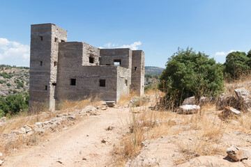 Ruins of the old building in the mountains.