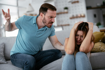 Violence in family. Husband beating his wife..