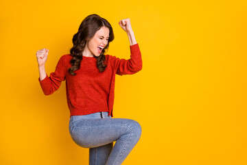 Portrait of her she nice-looking attractive lovely ecstatic overjoyed crazy cheerful cheery wavy-haired girl dancing rejoicing isolated over bright vivid shine vibrant yellow color background