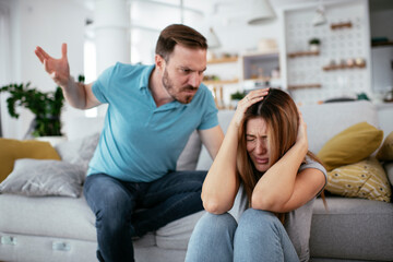 Violence in family. Husband beating his wife..