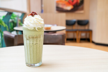 matcha green tea latte blended with whipped cream and red bean