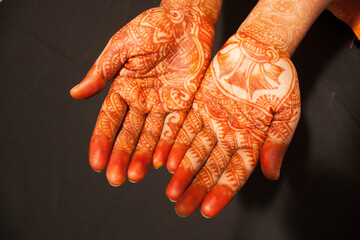 Indian traditional mehndi art on hands