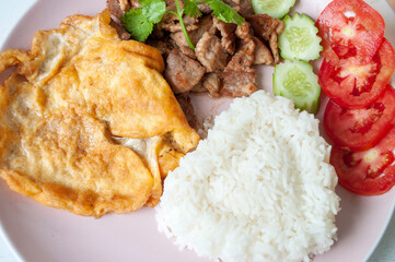 Fried Pork with Garlic Pepper Rice and Omelette, Popular Thai Food