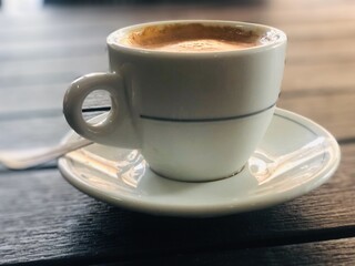 Cappuccino italian coffee on the table in a coffee bar