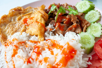 Fried Pork with Garlic Pepper Rice and Omelette, Popular Thai Food
