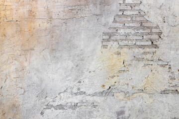 cracked plaster wall or cement brick wall surface texture grunge background