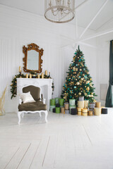 Christmas, xmas, New Year interior with gold and turquoise fur-tree, fir tree decoration with balls and flowers on white wall background. Selective focus