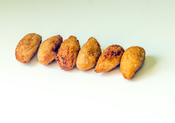 Croquettes surrounded by white background