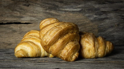 croissants on old wooden table