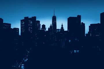 New York City skyline lights at night in blue monochrome colors