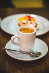 small mug of fragrant espresso coffee. morning breakfast