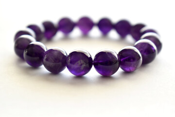 Amethyst bracelet crystal gemstone on white background. 