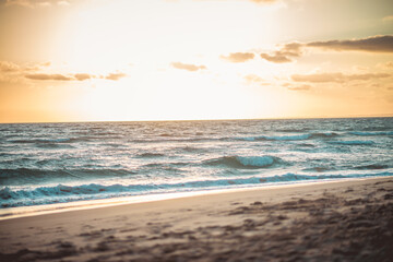 sunset time over the ocean waves.  vacation by the ocean.  sunset landscape