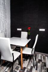 white kitchen table by the window