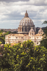 Obraz premium Dome of St. Peter in the Vatican city in Rome in Italy. Renovation works in the cathedral with scaffolding.