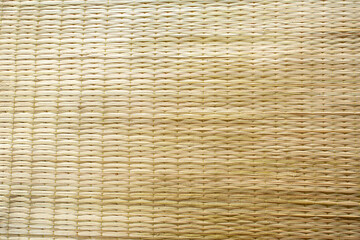 A floor mat made of Krajood, a species of reed which is tough, flexible and durable. Making of the mat is by exposing Kajood to the sun to dry completely, and then weave to the desired size.