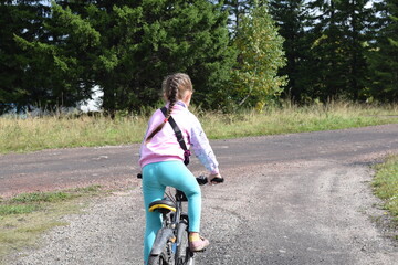 child riding a bike