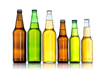 Group of Six bottles of beer isolated on white background