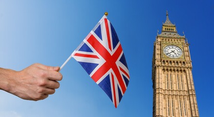 Fototapeta na wymiar Toursist in London with flag of Great Britain. Big Ben in background.