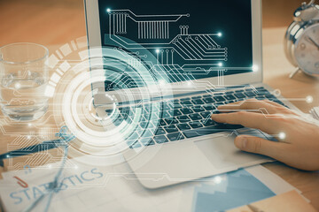 Businessman with computer background with technology theme hologram. Concept of big data. Double exposure.