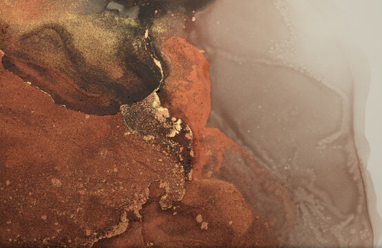 Gold and bronze grunge wall. Abstract painting flow blots background. Alcohol ink colors. Marble rust texture. © Liliia
