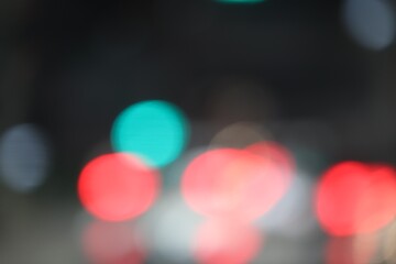 blurred of multi color lamp light in dark background